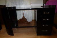 Modernist desk with four drawers